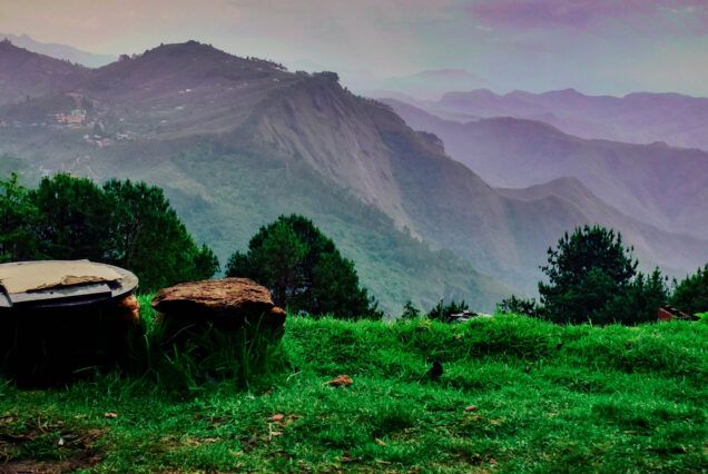 Adventurers backpacking through Kodaikanal’s lush forests, exploring hidden trails and waterfalls.